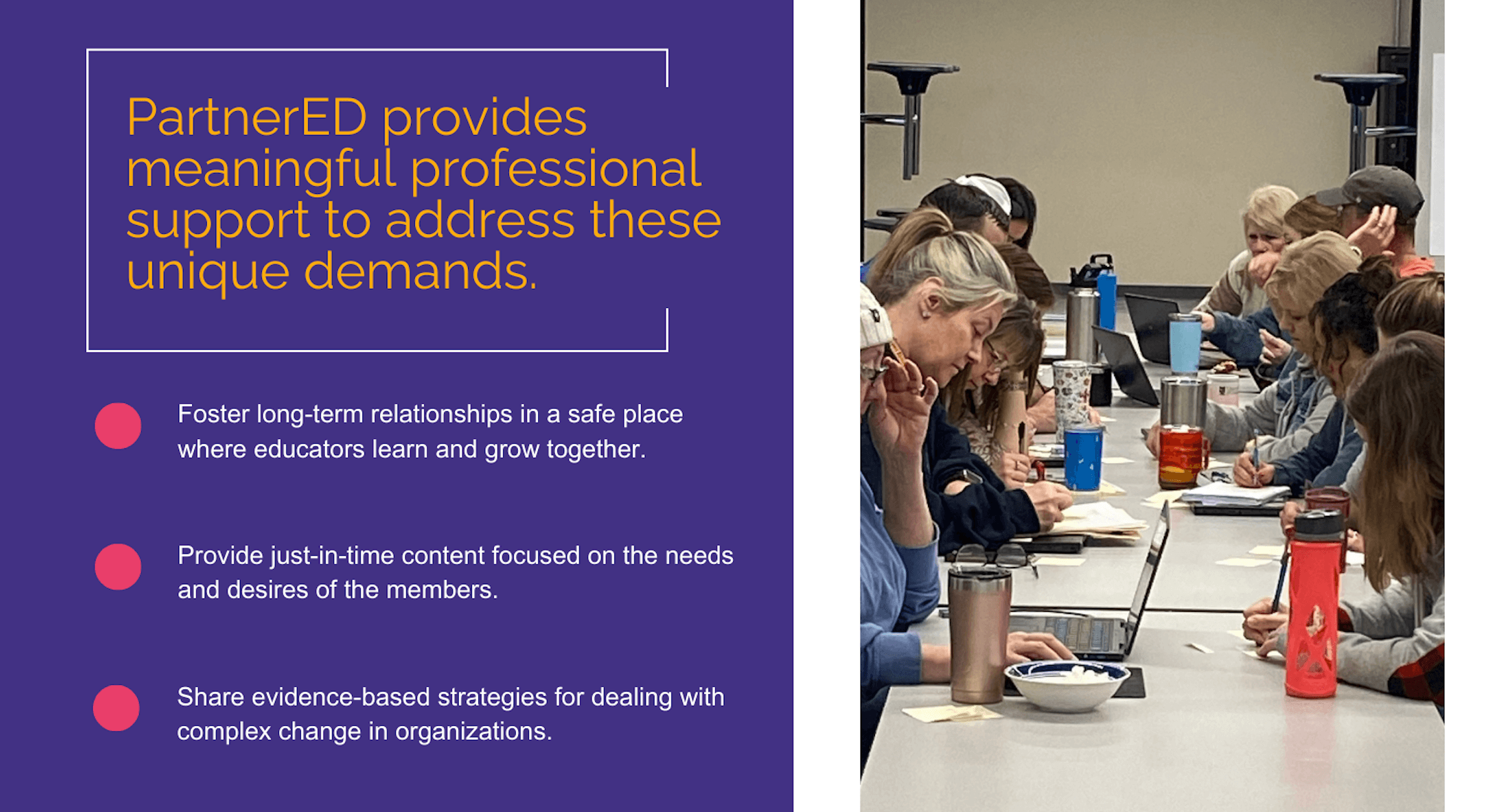 Teachers sitting at a long table writing