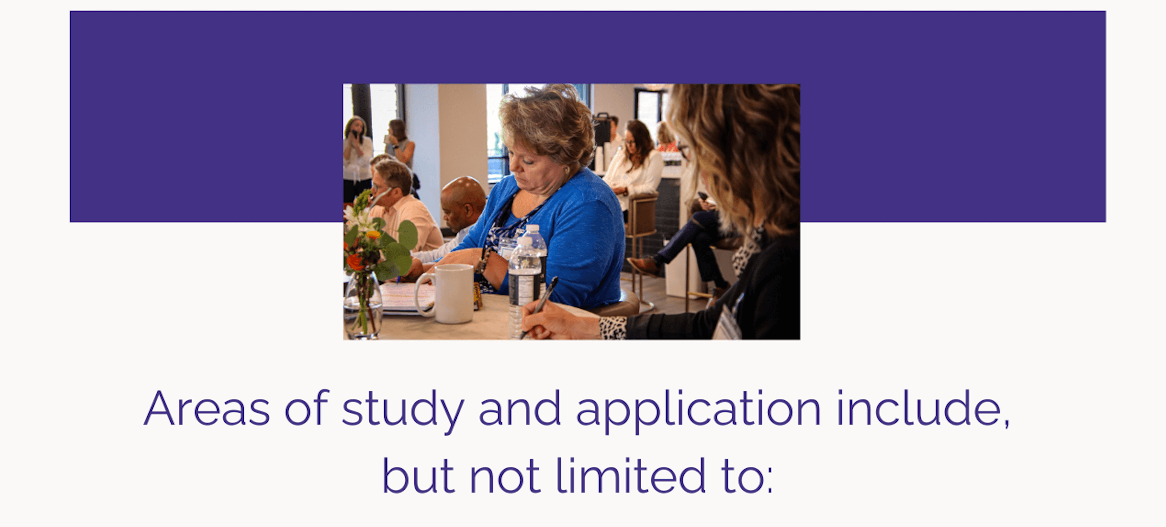 A woman writing something down