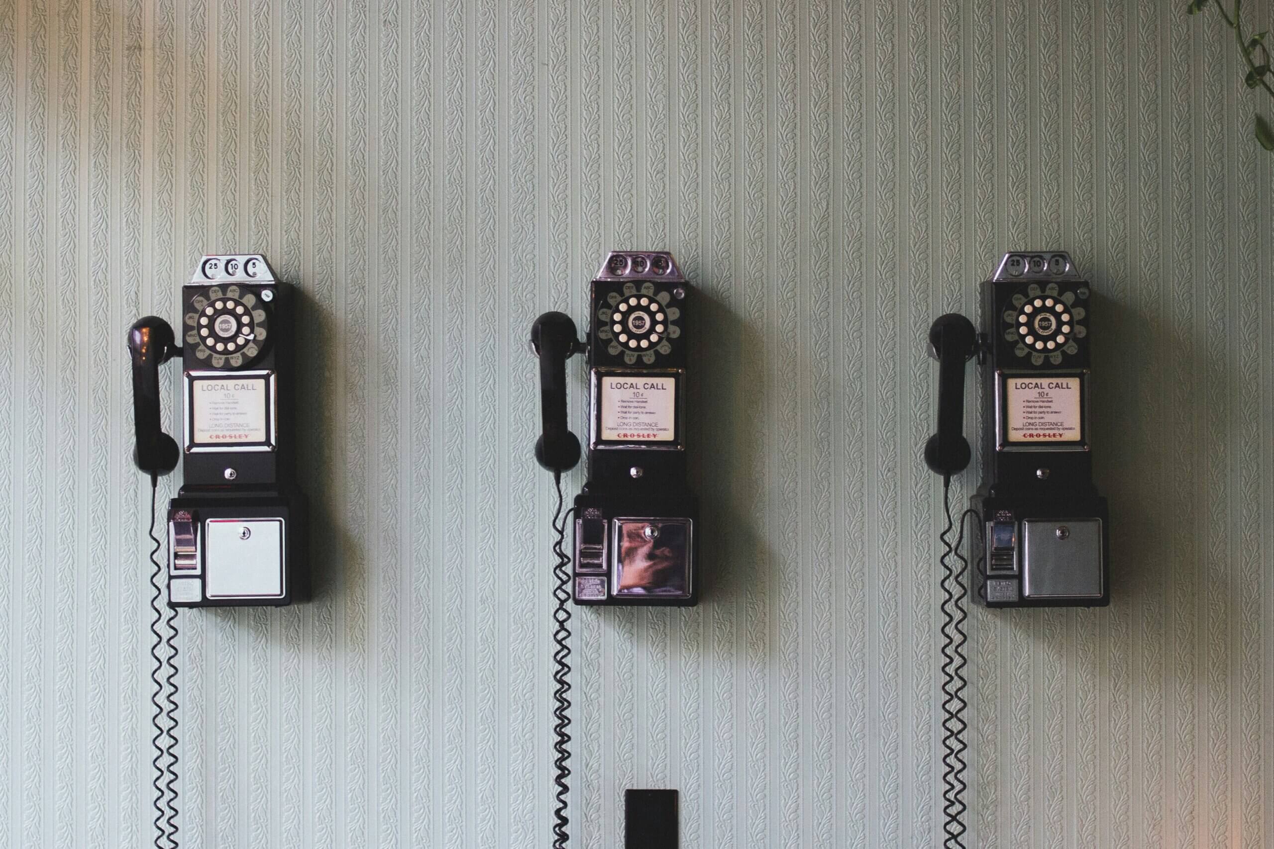 3 old telephones